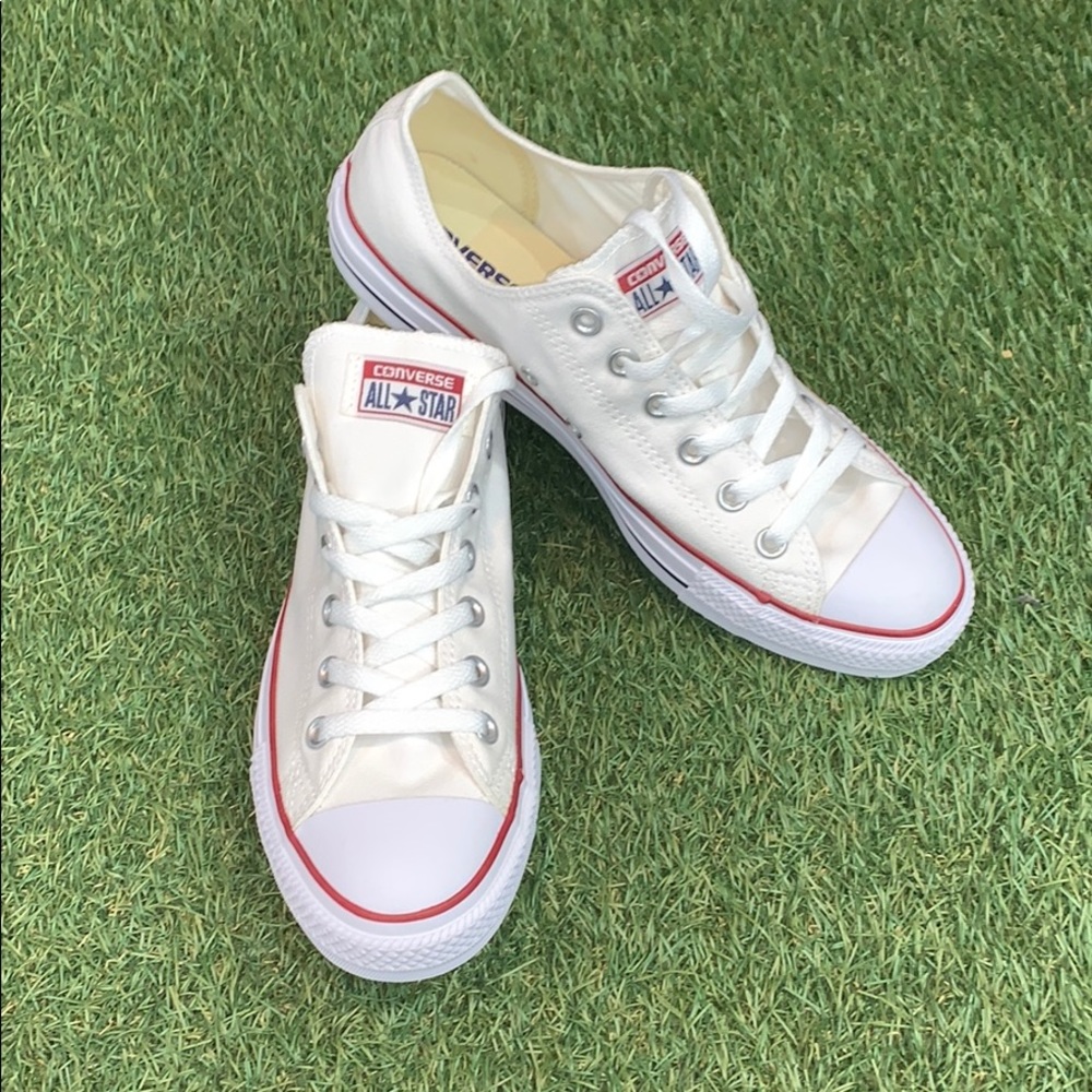Brand new white low top converse